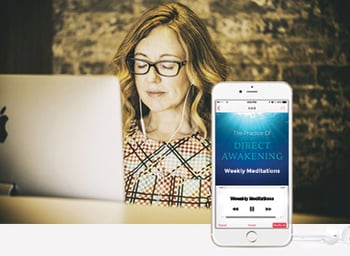 woman meditating at her computer